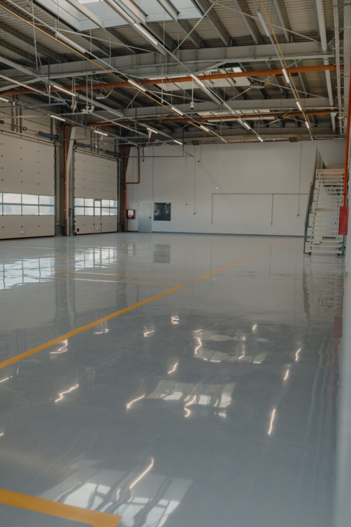 Epoxy and waxed flooring with colorful signage.